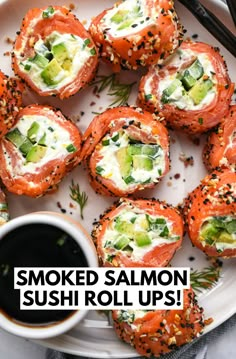 Smoked salmon sushi rolls filled with a cream cheese mixture, sliced cucumber and avocado sitting on a white plate next to a small bowl of citrus soy sauce Smoked Salmon Sushi Roll, Smoked Salmon Sushi, Salmon Sushi Rolls, Salmon Roll, Smoked Salmon Recipes, Salmon Sushi, Sushi Roll, Sushi Recipes, Goulash