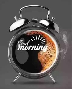 an alarm clock with the words good morning above it