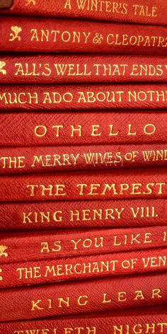 six red books with words written on them