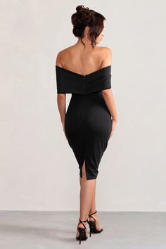 Meet Alyssa, our must-have midi dress made from a black scuba crepe that's both supportive and sculpting. Sure to turn heads at any formal event from birthdays to baby showers, this black bodycon dress features a Bardot neckline wrapped by a large bow and a split fitted skirt. Features - Premium scuba crepe - Bardot neckline - Large bow detail - Darted bodice - Bodycon fit - Invisible zip closure - Split hemline - Midi length Sizing & Fit Rona is 5’8' and wears UK size 8 / US size 4 Courtney is 5'10” and wears UK 16/ US 12 Product Information Designed exclusively at Club L London Good stretch Premium scuba crepe in Black (95% Polyester, 5% Elastane) 110cm total length SKU: CL127772002 We recommend buying a size down. Fitted Midi Bodycon Dress For Gala, Sleek Off-shoulder Bodycon Dress For Formal Events, Dressy Knee-length Midi Dress For Party Season, Fitted Black Off-shoulder Midi Dress, Fitted Midi Dress For Gala And Party Season, Fitted Midi Dress For Gala Party Season, Off-shoulder Midi Dress For Night Out Party, Elegant Off-shoulder Midi Dress For Party Season, Dressy Knee-length Party Midi Dress