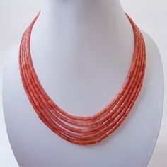 < Natural Reddish Pink coral necklace with silk fabrics handmade details > The product is made according to the model of authentic Indian jewelry. They make necklace even more refined and original. The coral is natural The ties are made of silk fabrics. They are pleasing to the body and make your look interesting even from behind. (100% Natural Coral) Gemstone : Natural Japanese Coral Type : Drum Beads Country/Region of Manufacture : India Total weight : 352'Carat Style : Charm Necklaces color : Reddish Pink Material : Coral Beads With (silk fabrics) shape : Handmade Drum Beads Hole size: 0.5 mm length: 18 to 24 inches  5' -row Beads size:  Length - 10/5.5 mm   Depth - 8/4.5 mm  Main Stone : Coral  Adjustable length : Yes Enjoy your shopping! Luxury Vintage Coral Necklace, Luxury Coral Necklaces With Natural Stones, Luxury Necklace With Round Red Coral Beads, Coral Beads Jewellery Indian, Coral Jewelry Vintage, Pink Beaded Necklace, Coral Beads Necklace, Coral Gemstone, Silk Fabrics