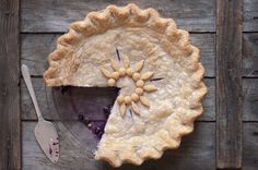 a pie sitting on top of a wooden table