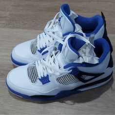 Introducing the Nike SAMPLE Air Jordan 4 IV Motorsports 2016 (308497-117) in Blue and White, designed for men who love basketball and style. This sneaker has a low top shoe shaft style and a tie closure, with a standard shoe width and a leather outsole material. The upper material is also made of leather, ensuring durability and comfort. The Air Jordan 4 model is a classic, and this 2016 release is a perfect addition to any sneaker collection. The royal theme and the iconic Jordan brand make this sneaker a must-have for any fan. This product is perfect for athletic activities, especially basketball. The shoe is manufactured in China and is available in UK Shoe Size 14, US Shoe Size 15, and EU Shoe Size 49.5. Blue Jordans 4s, Blue Jordan 4’s, Dark Blue Jordans, 11s Jordans, Dunks Blue, Nike Jordan Air 1, Jordan 5s, Nike Shoes For Men, Nike Shoes For Boys