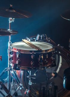 a close up of a drum set on stage