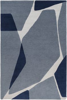 a blue and white rug with an abstract design on the bottom, in front of a gray background