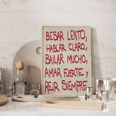 there is a sign that says besar lento, habar claro, bailar mucho, amar fete y rer semere