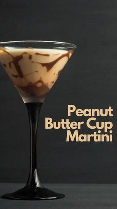 a martini glass filled with peanut butter cup martini