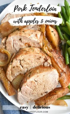 pork tenderie with apples and onions on a white platter next to green beans