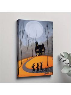 a painting on the wall of a house with three witches in front and a full moon behind it