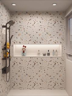 a bathroom with a shower, sink and shelf