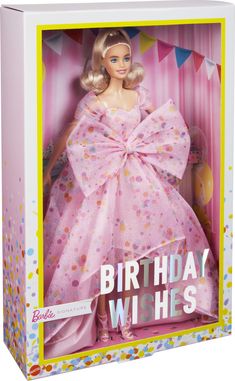 a barbie doll in a pink birthday dress