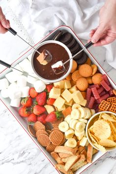 a tray filled with different types of snacks