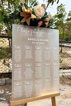 a table plan with flowers on it in front of a fenced in area for seating