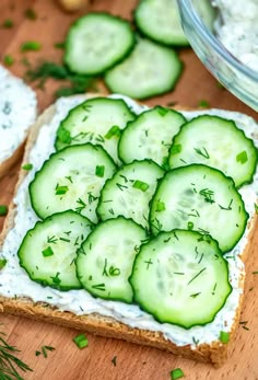 cucumber slices are arranged on top of bread