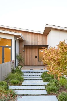 a house with steps leading up to the front door