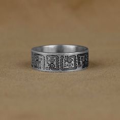 Unique Aztec and Mayan Hieroglyphics Band Ring, Ancient Unique Ring, Mythology Ring Jewelry, Ring For Best Friend, Gift For Husband, Gifts Made of 925 silver and handcrafted by hand, this ring is not only an accessory piece that complements your daily elegance, but also has details that will reflect your character and style. It is also a great gift to give to your loved ones on their special days. At SavisSilver, we always give importance to the satisfaction of our customers, we recommend you to Symbolic Engraved Ring For Promise, Symbolic Engraved Stamped Ring For Promise, Mayan Hieroglyphics, Husband Gifts, Gift For Husband, Unique Ring, Best Friend Gift, Family Heirloom, Jewelry Ring