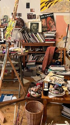 an artist's studio with lots of art supplies