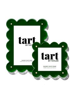 two tags that say tart by taylor and are green with gold trimmings