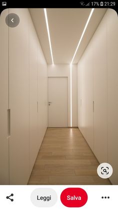 an image of a hallway with white walls and wood flooring on the phone screen