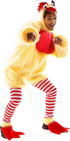 a man dressed as a chicken holding a heart in his right hand and wearing striped tights