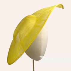 Get Royal Ascot ready with this extra large pointed tip Yellow sinamay fascinator base! Made from a triple layer of stiffened sinamay millinery fabric and is ideal for making an instant hat. This shape has a lovely pointed tip and a shallow crown. Get creative by positioning it at different angles on the head! Just add a headband for securing to the head (not included but available in our shop!) *This is not a fitted hat! You will need to sew in a headband or comb to attach it to your head* Meas Fitted Sinamay Mini Hats For Summer, Fitted Sinamay Fascinator For Summer, Summer Fitted Sinamay Fascinator, Spring Church Fascinator In Sinamay, Spring Church Sinamay Fascinator, Brimmed Sinamay Fascinator For Summer, Spring Fascinator With Sinamay And Curved Brim, Brimmed Sinamay Fascinator For Church, Fitted Sinamay Boater Hat With Short Brim