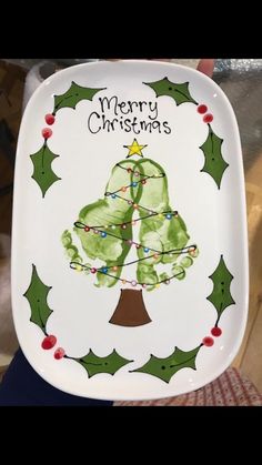 a plate with a christmas tree painted on it