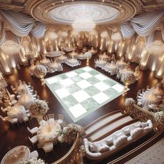 an elaborately decorated ballroom with white and gold decor