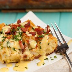 a close up of food on a plate with a fork