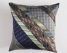 a decorative pillow with ties on it