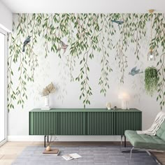 a living room scene with focus on the wallpaper and green cabinet against the wall