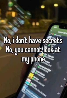 someone holding up their cell phone with the text no, i don't have secrets no, you cannot look at my phone