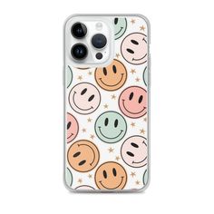 an iphone case with smiley faces and stars on the front, in pastel colors