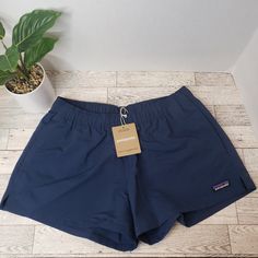 Elevate Your Summer Wardrobe With These Nwt Women's Patagonia Barley Baggy Shorts In Tidepool Blue, Size Xs. These Stylish Shorts Feature A Solid Pattern, Flat Front, And Mid-Rise Fit For A Comfortable And Flattering Look. The Pull-On Closure And Drawstring Waist Make Them Easy To Wear, While The Slash Mesh Pockets Provide Ample Space For Your Essentials While Allowing For Quick Dry. Made With 100% Recycled Nylon Fabric, These Shorts Are Not Only Stylish But Also Eco-Friendly. They Are Machine W Patagonia Baggies Women, Womens Patagonia, Patagonia Baggies, Stylish Shorts, Patagonia Shorts, Baggy Shorts, Tide Pools, Nylon Fabric, Patagonia Womens