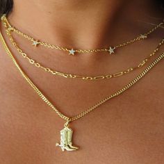 Saddle up in style with our Giddy Up Necklace! Featuring a charming cowboy boot pendant and a dazzling hand-set Cz stone, this necklace is perfect for any cowgirl looking to add some flair to their outfit. Giddy Up, Cowgirl Look, Cow Girl, Cowboy Boot, Cz Stone, Silver Necklaces, Cowboy Boots, In Style, Saddle