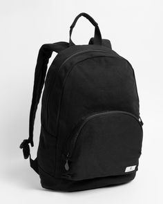 Lightweight and versatile, the Schoolyard Canvas Backpack features two zippered compartments, soft adjustable straps, and a unique print that's sure to set you apart from the pack. Featured here in new black. - Features

 - 17" X 11.5" X 5"
 - Large Main Compartment
 - Front Zip Pocket
 - Padded Shoulder Straps
 - Woven Patch Labels School Yard, Black Features, Black Back, The Pack, Canvas Backpack, Unique Print, New Black, Shoulder Straps, Zip Pockets