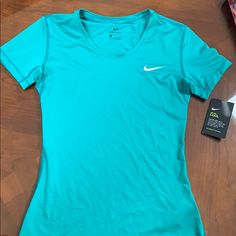 Wicking Dri-Fit Stretch Athletic Top, Teal Colored. Size Medium Per Tags But Fits More Like A Contoured Small. Teal Nikes, Teal Shirt, Dri Fit Shirt, Purple T Shirts, Cute Blouses, Athletic Shirts, Bear T Shirt, Future Outfit, Nike Shirts