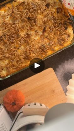 a casserole dish with meat and cheese in it