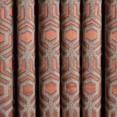 an orange and grey curtain with hexagonal design