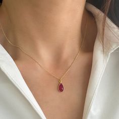 Tiny Ruby Necklace with a Genuine Ruby Pendant! This Ruby Gemstone Necklace is a July Birthstone Necklace! ✔️Genuine Red Ruby Necklace✔️ High-Quality  925 Sterling Silver ✔️ 24K Gold  Finish✔️ This Real Ruby necklace is great for wearing alone or for layering with other necklaces. It is the perfect gift for your girlfriend, sister, bridesmaids, or even yourself! Made by hand in Greece.   Moreover, RUBY is a really powerful crystal that promotes self-confidence and good fortune 👉A few words about Genuine Red Ruby . Rubies are thought to guarantee good health, wealth, wisdom, and success in love. Ruby is a symbol of good fortune, pure love, and loyalty.  As an aphrodisiac stone, it brings vigor into your life. It brings harmony and deep inner self-knowledge.     >>Chain SIZE Available optio Red Teardrop Gemstone Drop Necklace, Gemstone Teardrop Pendant Drop Necklace, Red Gemstone Drop Necklace For Gift, Ruby Drop Necklace For Gift, Red Teardrop Gemstone Necklace, Drop Gemstone Crystal Necklace, Ruby Teardrop Pendant Necklace, Real Ruby Necklace, Red Ruby Necklace