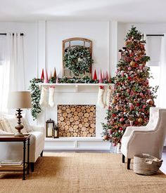 a living room decorated for christmas with a tree in the corner