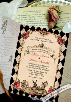 an old fashioned wedding card with roses on it and other items around the card holder