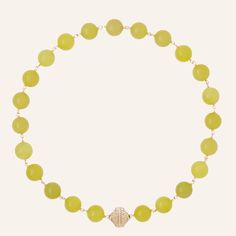 Caspian Victoire Lemon Jade 12mm Necklace Yellow Gold Jade Round Beads Jewelry, Playful Yellow Round Beads Jewelry, Yellow Oval Polished Bead Jewelry, Yellow Round Glass Bead Jewelry, Lemon Quartz Necklace, Magnetic Jewelry, Jade Necklace, Strand Necklace, Tassels