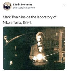 an old photo of mark twain inside the laboratory of nikola tesla, 1934 text reads life in moments @ historyinmoment