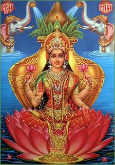 the hindu goddess sitting on top of a lotus