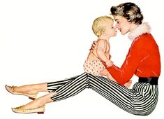 a woman sitting on the ground holding a small child in her lap and kissing her cheek