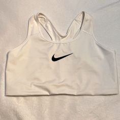 White Nike Sports Bra Size 1x Bnwot White Go-dry Activewear For Sports Events, White Athletic Fit Sports Bra With Go-dry, White Activewear For Sports Events With Go-dry Technology, White Sports Bra For Sports Events, White Sports Bra With Medium Support, Casual White Athletic Fit Sports Bra, White Nike Activewear For Light Sports, Nike White Activewear For Light Sports, White Nike Athleisure Activewear