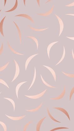 an abstract pink and gold background with wavy shapes