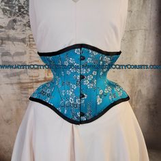 Brand New underbust corset from "MystiC City Corsets" design: MCC-20C ( conical)   color: Picture -  100% cotton twill lining - Steel boned (20 x 6mm wide spiral steel bones, 6 x 12mm wide flat steel bones ) - Front busk - Steel boned floating modesty panel - regular "shoe" style lace Blue Fitted Underbust Corset Dress, Blue Fitted Corset For Costume Party, Blue Overbust Corset With Boned Bodice, Blue Overbust Corset For Costume Party, Blue Underbust Corset With Fitted Bodice, Fitted Overbust Corset For Costumes, Blue Underbust Corset With Boned Bodice, Fitted Cosplay Corset With Boning, Fitted Corset With Boning For Cosplay