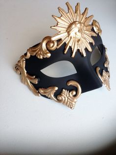 The Mask base is painted in a rich black shade and the embellishing pieces are painted in a brilliant Gold using high quality paints. Other Color combinations also available. S H I P P I N G - Processed same day or within 24 hours. 1-2 day guaranteed delivery services offered, add items to cart and click on shipping tab for rates. Pls leave a check out note with your need date & contact number (especially for expedited and custom orders) Msg for delivery time frames (Include your state/count Black Masquerade Mask For Festivals, Black Masquerade Mask For Festivals And Costume Party, Black Masquerade Mask For Carnival, Venetian Black Masquerade Mask For Festivals, Black Masquerade Mask For Party And Festivals, Black Masquerade Mask For Party Festivals, Vintage Black Masquerade Mask, Artistic Black Masquerade Mask For Carnival, Masquerade Event