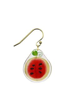 a pair of earrings with watermelon on it